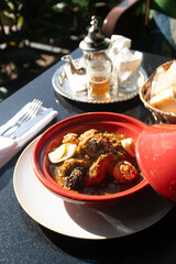 Moroccan beef tagine with prunes, boiled eggs, sesame seeds and walnuts
