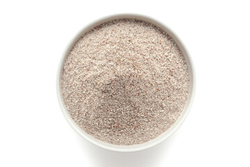Organic Ragi Flour (Eleusine coracana) or Finger Millet Flour in a white ceramic bowl. Isolated on a white background. Top View