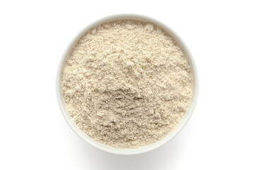 Bowl of organic Multi-Grain Flour isolated on a white background, top view.