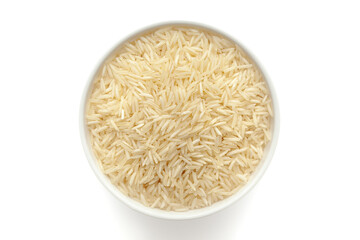 Organic White rice (Oryza sativa) in a white ceramic bowl. Isolated on a white background. Top View