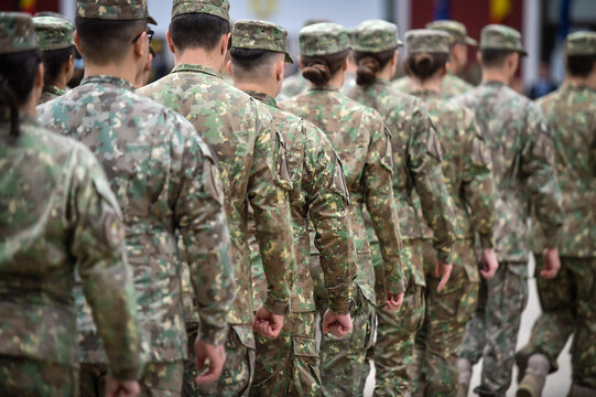 Soldiers in marching formation during military recruitment