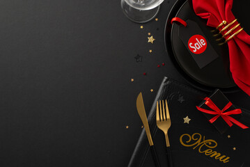 Restaurant Black Friday bargain scene. Top view of dishes, "sale" label, utensils, red napkin and holder, ordering menu, wine glass, glitzy confetti and giftbox on black background, text or promo room