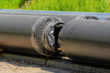 Large diameter pipes prepared for installation. Pipeline construction