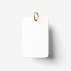 A precise mockup of a tag or label with editable text isolated on white background top view.