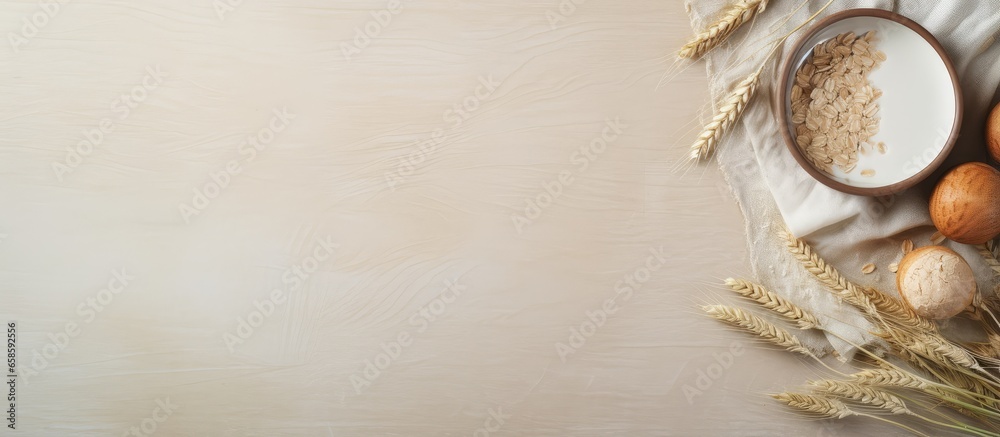 Wall mural Uncooked oats on the isolated pastel background Copy space Nourishing sustenance