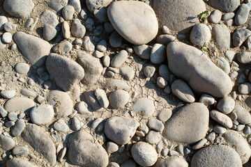 Gravel river during drought in Georgia in summer. Texture background
