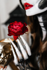 halloween party. female hand with makeup and nail art