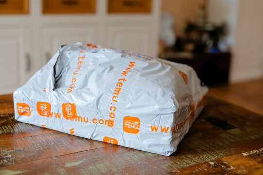 Berlin, Germany - September 23, 2023: Package of a Chinese mail order company.