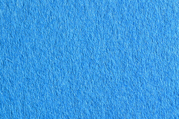 青い色画用紙を拡大撮影した質感のあるテクスチャー素材