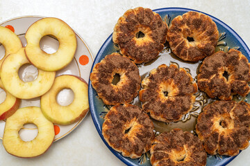Apple rings are raw and baked in cinnamon dough.