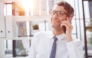 Man accountant or business lawyer talking on smartphone