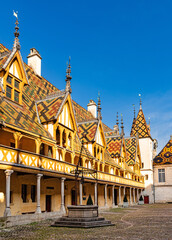 The Hospices de Beaune or Hôtel-Dieu de Beaune is a former charitable almshouse in Beaune, France - obrazy, fototapety, plakaty