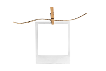 polaroid on clothespin / polaroid frame and clothespin attached to a rope isolated on white background 