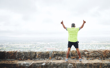 Senior man, celebration and winner for race, hike or marathon for health, wellness and fitness. City, run and thumbs up for goal, workout and victory for achievement, elderly and freedom retirement