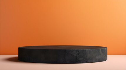 Round Stone Podium in front of a light orange Studio Background. Black Pedestal for Product Presentation