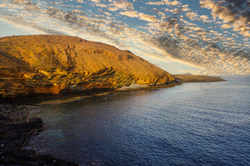 Yellow Mountain Montaña Aamarilla) next to Costa del Silencio (Tenerife). Explosion of shapes and colors at sunset