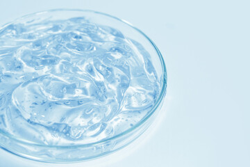blue cosmetic or medical gel in a Petri dish