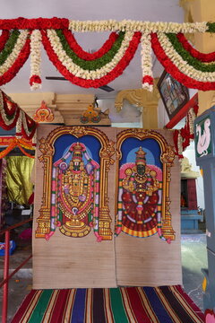 stage decoration with idols of lord Venkateswara and ambal in the background