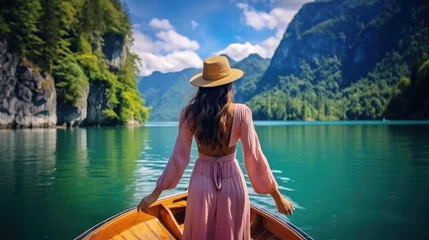 Foto op Canvas Beautiful young woman traveling by boat , Standing on the boat at tropical island beach lagoon © Atchariya63