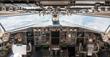 airplane cockpit in flight - obrazy, fototapety, plakaty