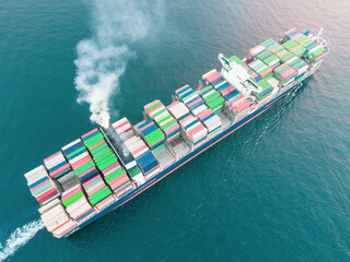 Aerial view of freight ship with cargo containers.