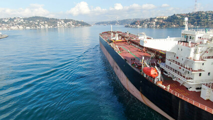 Aerial view of freight ship with cargo containers.