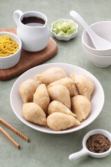 Pempek, mpek-mpek and also known as colloquially as empek-empek is a savoury Indonesian fishcake delicacy, made of fish and tapioca, from Palembang, South Sumatera, Indonesia. 