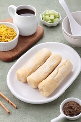 Pempek, mpek-mpek and also known as colloquially as empek-empek is a savoury Indonesian fishcake delicacy, made of fish and tapioca, from Palembang, South Sumatera, Indonesia. 