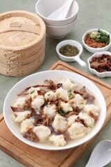 Pempek, mpek-mpek and also known as colloquially as empek-empek is a savoury Indonesian fishcake delicacy, made of fish and tapioca, from Palembang, South Sumatera, Indonesia. 