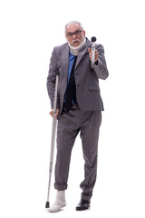 Old businessman after car accident isolated on white