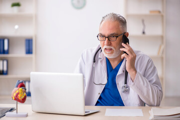 Young male doctor in telemedicine concept