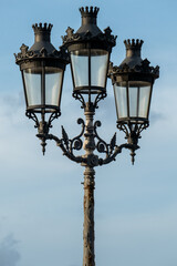 Fototapeta na wymiar Antique street lights in Ciutadella, Menorca, Spain