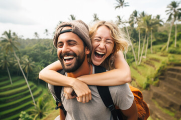 Fototapeta premium Digital nomads hugging and laughing in Bali