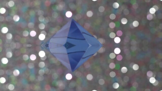 Diamond blue artfully mirrored rotates in circles