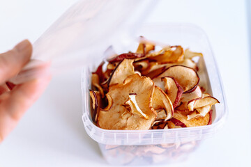 storing apple chips in an eco-plastic box