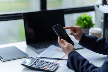 financial analysts analyze business financial reports planning investment project during a discussion at a meeting of corporate showing the results of their successful teamwork.