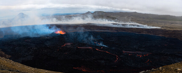Fototapeta premium Panoramic of volcano near Reykjavik. Iceland 2023. Lava flow. Icelandic landscape. Global warming concept