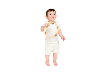 Happy baby play musical instruments on studio, isolated on white background. Portrait of a smiling child and playing the tambourine. Kid about two years old (one year nine months)