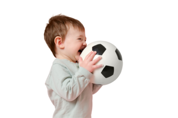Happy toddler baby with a soccer ball on a studio, isolated on white background. Child boy holding a sports ball in his hands, isolated on white background. Kid age one year eight months