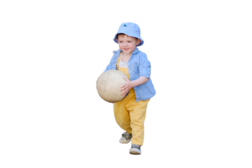 The child's happiness is evident as they run after the ball on the sports field, isolated on white background. Baby is happily playing with the white ball. Kid aged about two years