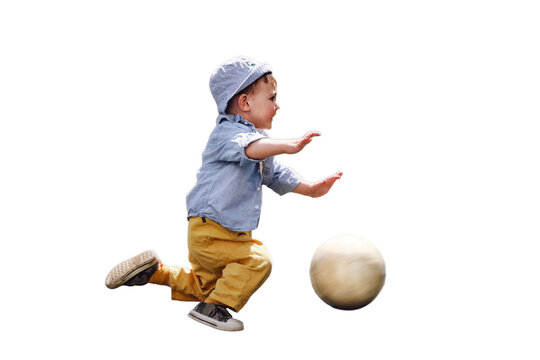 A child falls while playing with a ball on a football field, isolated on white background. Kid aged about two years (one year eleven months)