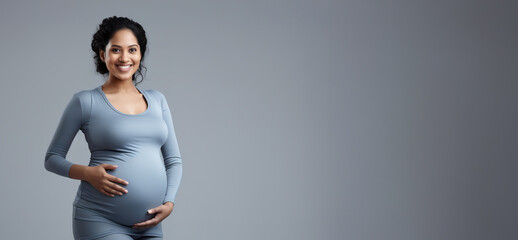 banner pregnant Indian woman in sportswear, copy space, expecting lady doing sport , Healthy lifestyle during pregnancy. - obrazy, fototapety, plakaty