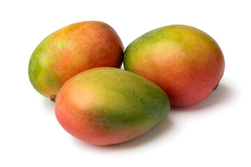 Fresh ripe mango close up isolated on white background close up