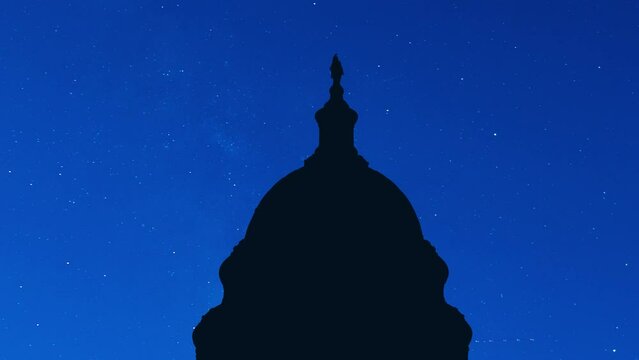 US Capitol dome at night clear sky full of stars
