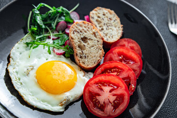 egg fried breakfast tasty fresh vegetable, toasted bread eating cooking appetizer meal food snack on the table copy space food background rustic top view