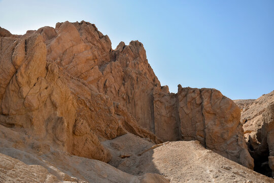 View of the mountain of natural sandstone against the blue clear sky. Desert landscape, Egypt, Africa. Copy space. Selective focus.