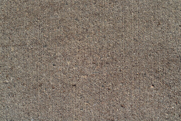 Sidewalk textured with small rocks