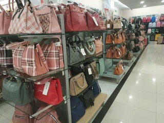 various bags displayed in the shop, women's bags