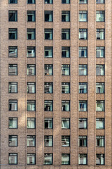Fototapeta premium brick wall facade with open and closed windows of historic Ritz-Carlton hotel in New York