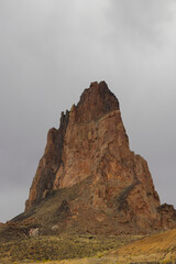 Agathla Peak, an eroded volcanic plug considered sacred by the Navajo, near Monument Valley, AZ